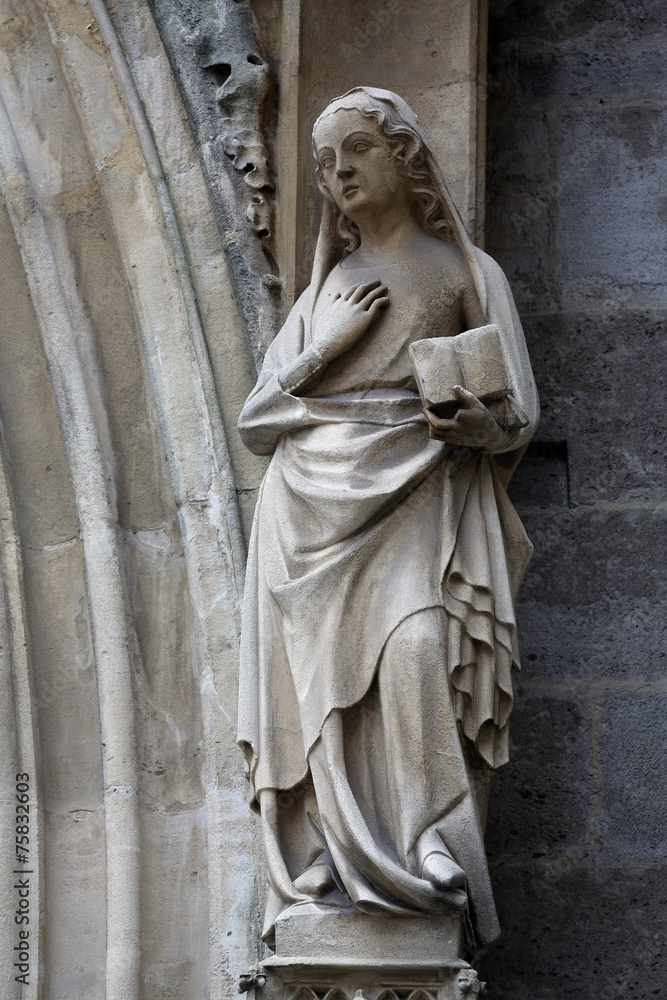 Statue of Saint, facade of Minoriten kirche in Vienna