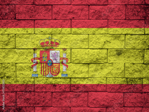 Spain, Spanish flag on wall textured background