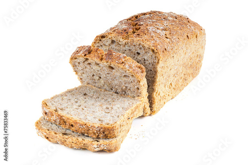 Cut wholemeal bread on white background