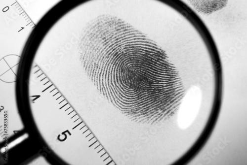 Fingerprint on white paper.