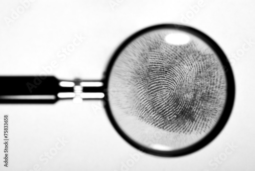 Fingerprint on white paper.