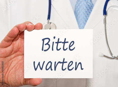 Bitte warten - Arzt mit Schild