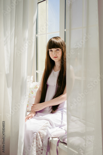 Free Download one young girl on the window - GFXLoad