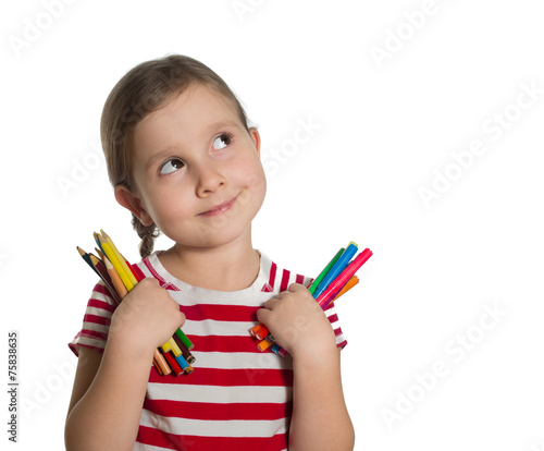 cute little girl holding colourful pencils and markers looking u
