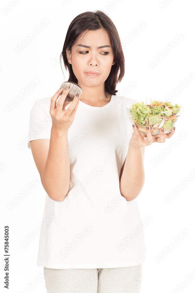 Pretty girl eating fresh vegetable salad Pretty girl eating fresh vegetable salad