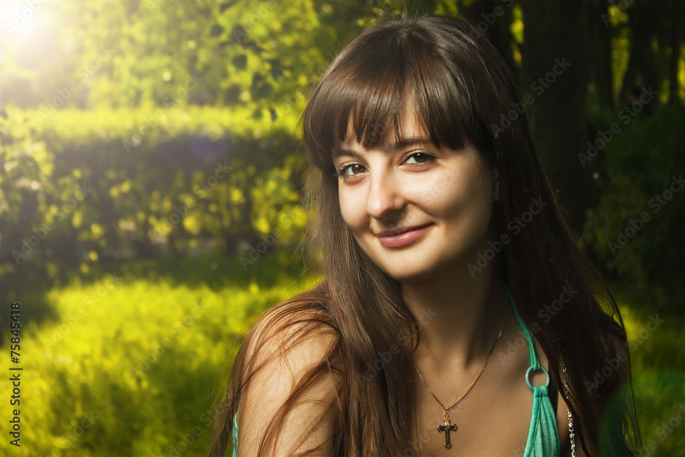 outdoor portrait of beautiful smiling girl with the sun and lens outdoor portrait of beautiful smiling girl with the sun and lens