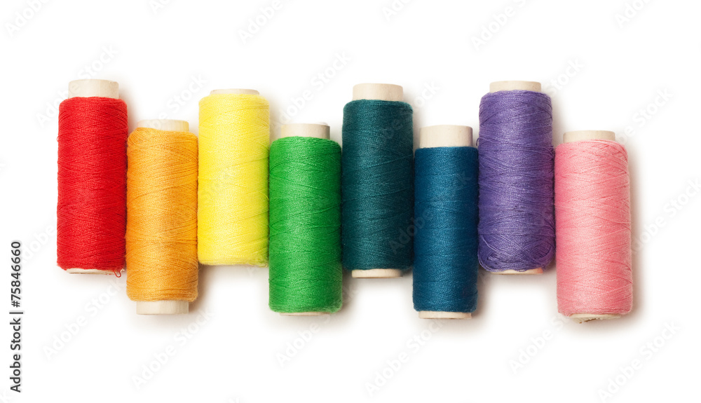 rainbow colored set of threads isolated over white rainbow colored set of threads isolated over white