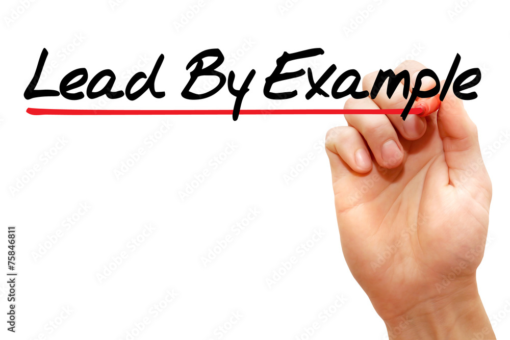 Hand writing Lead By Example with marker, business concept Hand writing Lead By Example with marker, business concept