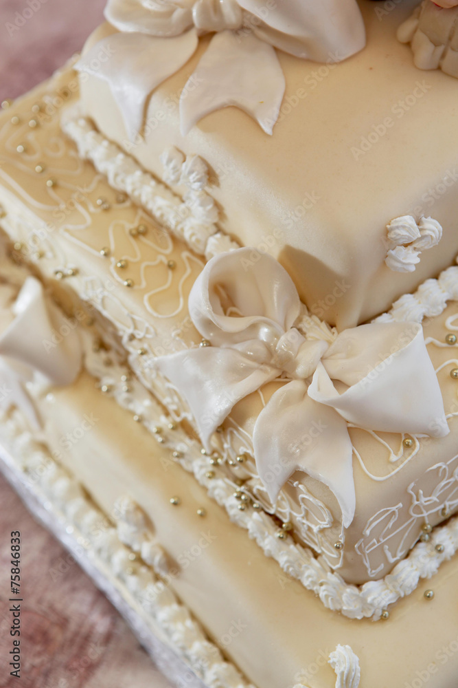 Wedding cake with ribbons and beads part