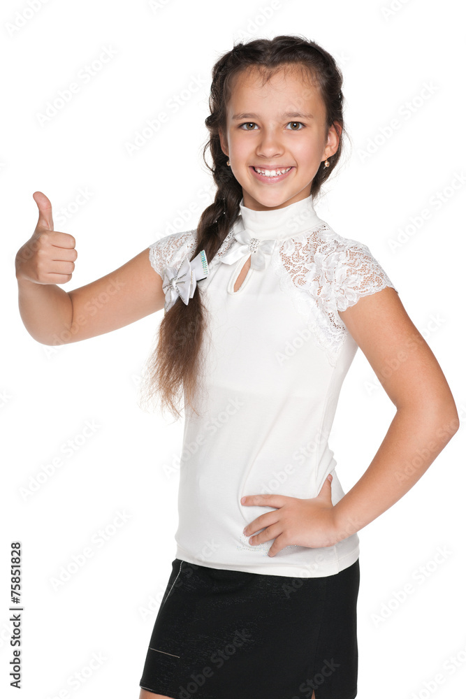 Happy girl holds her thumb up
