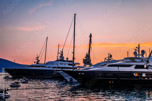 Sailing boats in marina at sunset. © Kushch Dmitry
