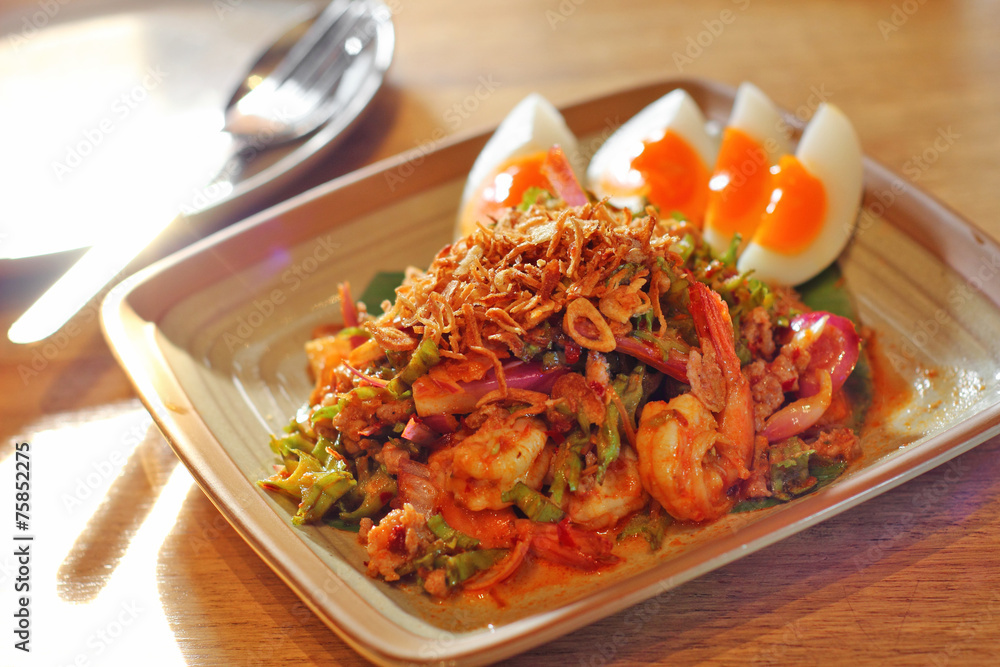 close up thai spicy seafood salad in ceramic dish close up thai spicy seafood salad in ceramic dish