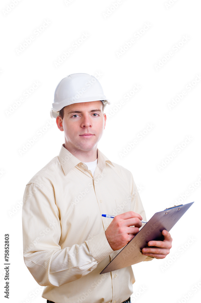Engineer in helmet writing something Engineer in helmet writing something