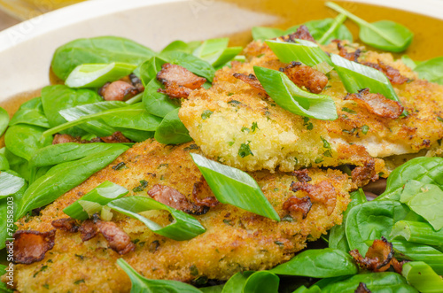 Rabbit steaks with herbs and sour cream