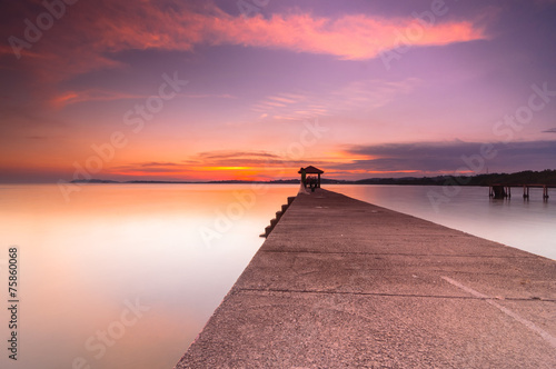 Fototapeta Naklejka Na Ścianę i Meble -  sunset at fishing jetty