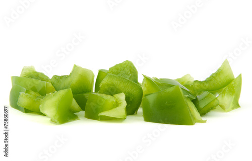 Chopped green pepper on white background.