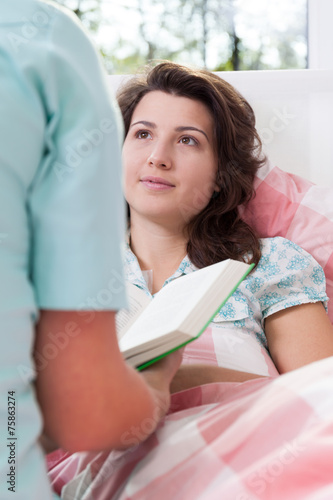 Girl lying in hospital