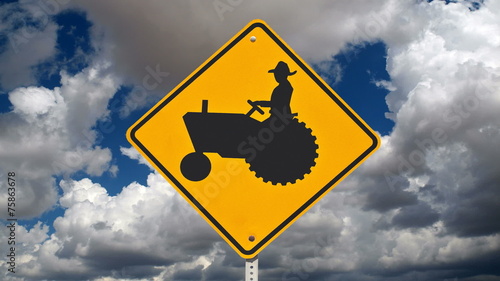 Farmer Crossing Safety Sign with Time Lapse photo