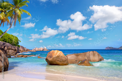 Takamaka beach with granite rocks, Mahe Island, Seychelles