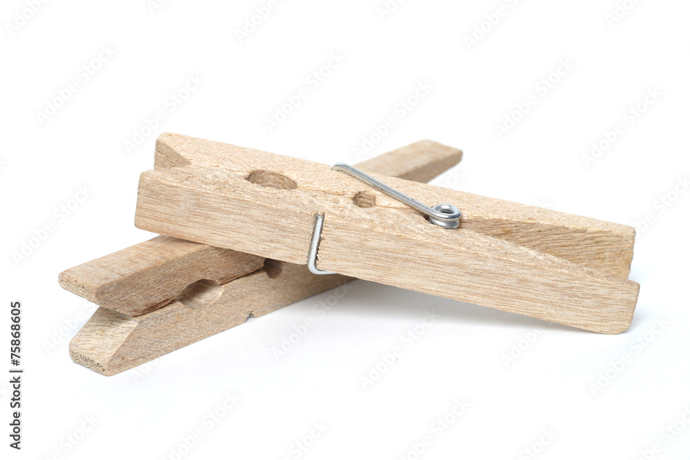 Wooden clothes peg isolated on a white background. Wooden clothes peg isolated on a white background.