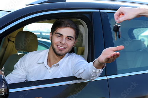Young man in car