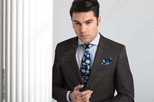 elegant business man looking at the camera photo