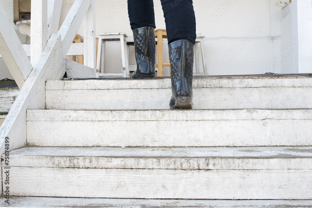 female is walking up on stairs female is walking up on stairs