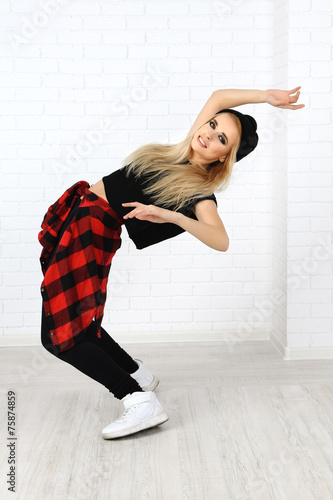 Hip hop dancer dancing on w...