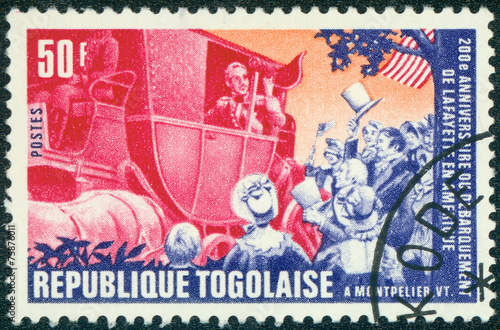 stamp printed by Togo, shows Lafayette arriving in Montpelier