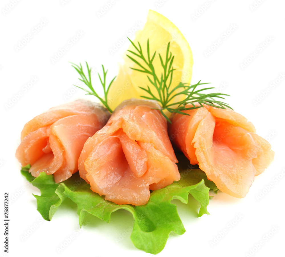 Sliced and rolled salmon with lemon slice Sliced and rolled salmon with lemon slice