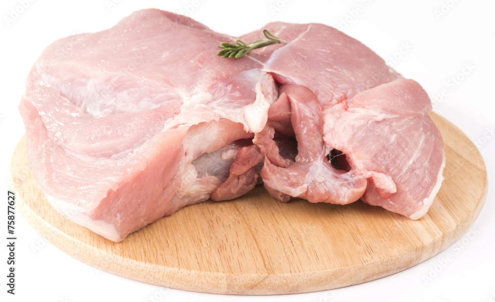 bonless pork on wooden board. isolated on white background. bonless pork on wooden board. isolated on white background.