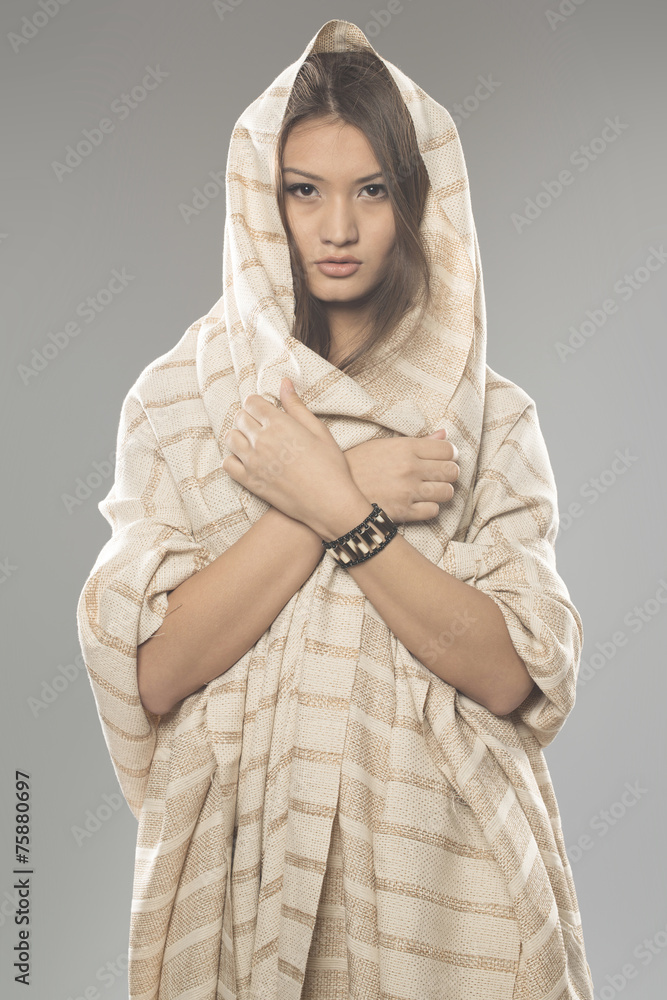 Beautiful Asian woman with crossed hands. wearing ancient clot Beautiful Asian woman with crossed hands. wearing ancient clot