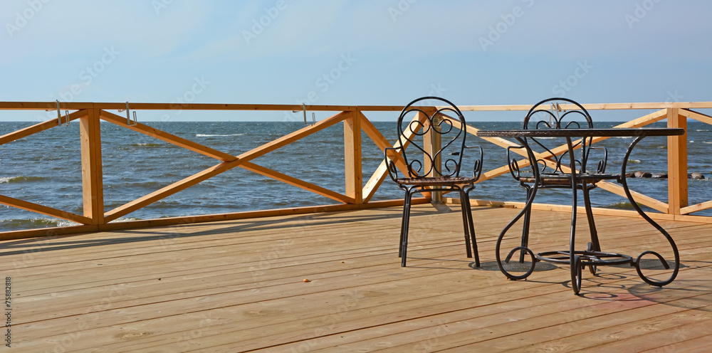 Restaurant terrace on the sea shore Restaurant terrace on the sea shore