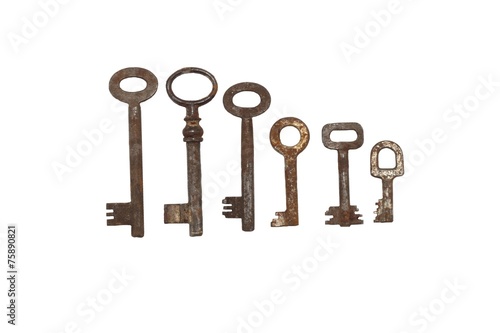 collection of old rusty keys, isolated on white © martinfredy