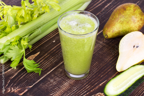 Cucumber, pear and celery juice. Slices of fruits and vegetables