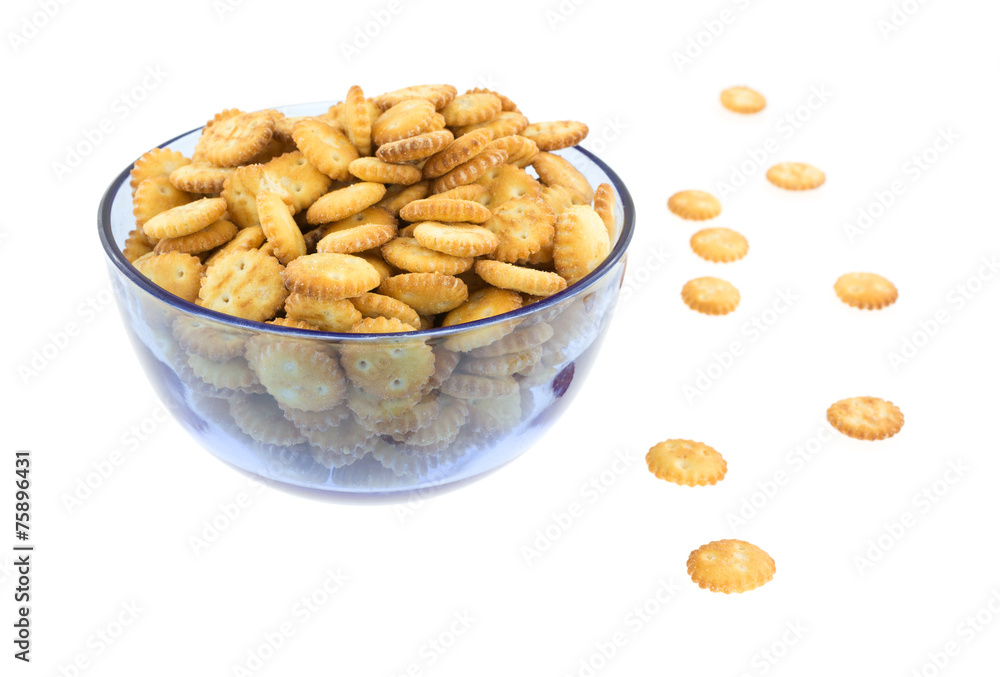 Small snack crackers in blue bowl Small snack crackers in blue bowl