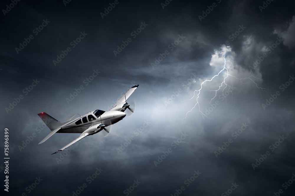Fototapeta premium Aeroplane in thunderstorm