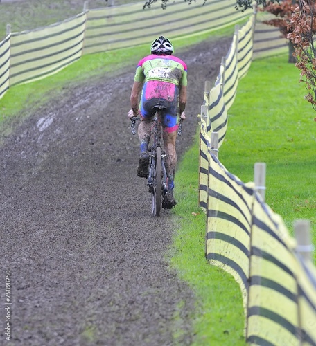 Quadro su tela Cyclist compete in cycle race of cyclocross