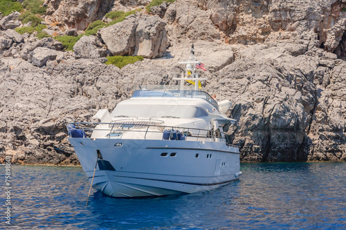 Yacht at the rocky shore of the island of Rhodes. Greece © Nikolai Korzhov