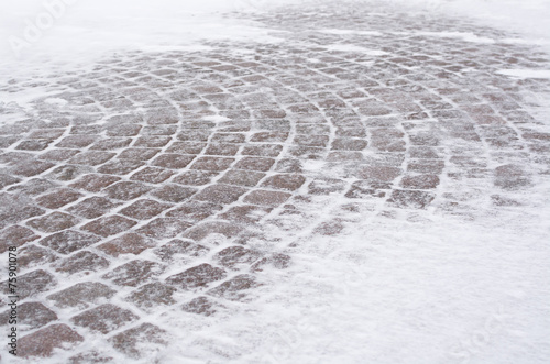 Canvas Print Street tiles with snow
