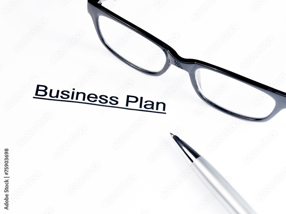 business plan words near glasses and pen, business concept business plan words near glasses and pen, business concept