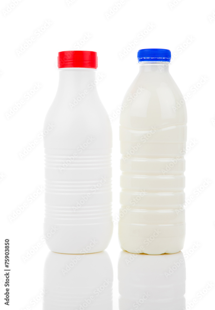 two bottles of milk isolated on white background two bottles of milk isolated on white background