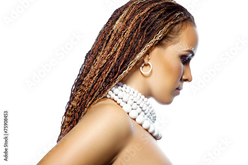 Beautiful woman with african necklace. Fashion photo