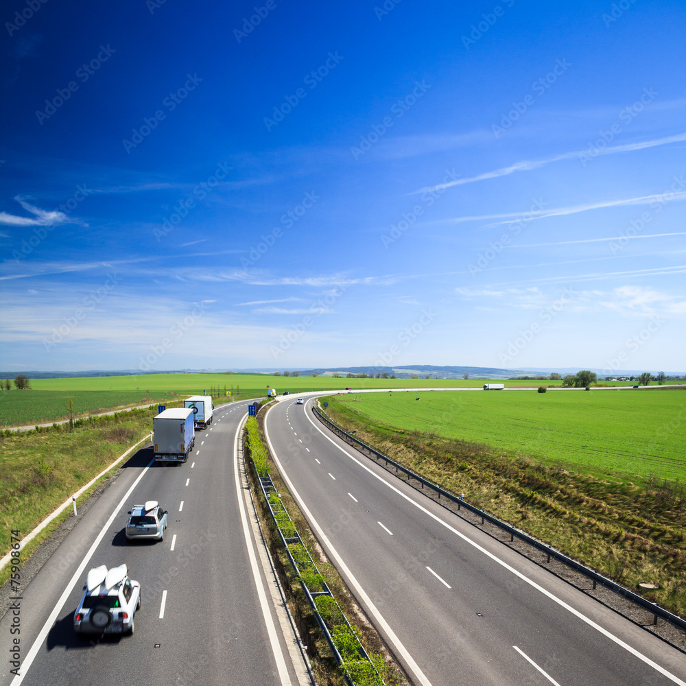 Fototapeta premium highway traffic on a lovely, sunny summer day