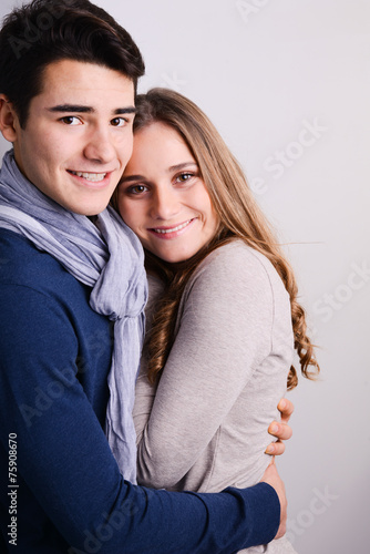 close up studio portrait of a beautiful young couple man woman