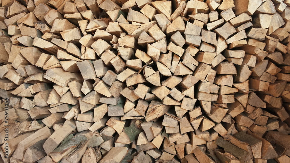 Pile of chopped fire wood prepared for winter - dolly motion Pile of chopped fire wood prepared for winter - dolly motion