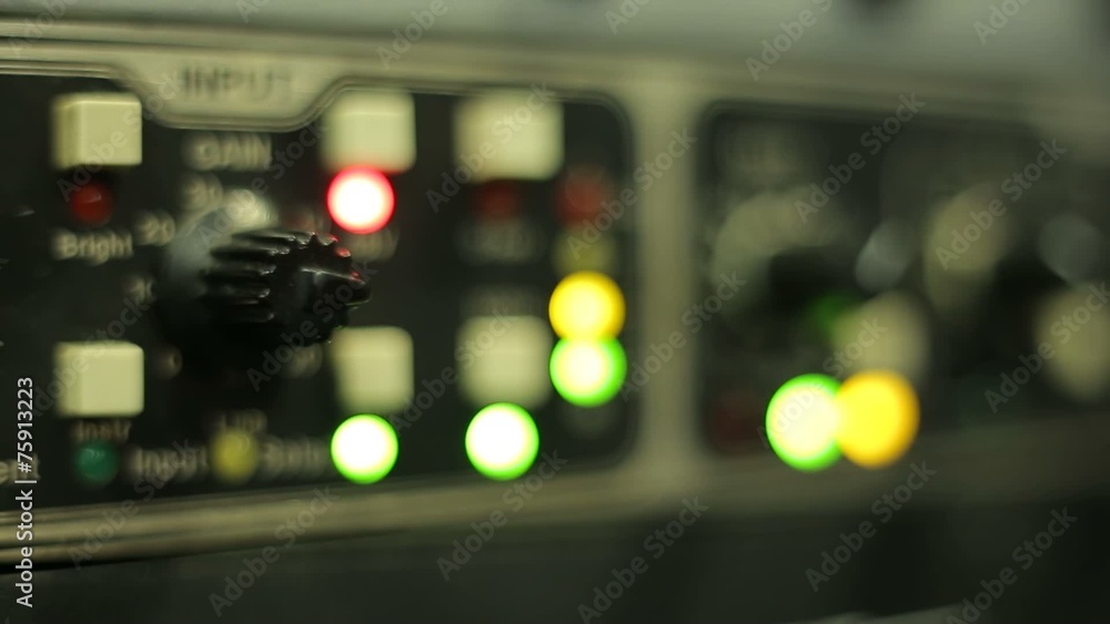 Sound recording in a recording studio, bright glowing lights on Sound recording in a recording studio, bright glowing lights on