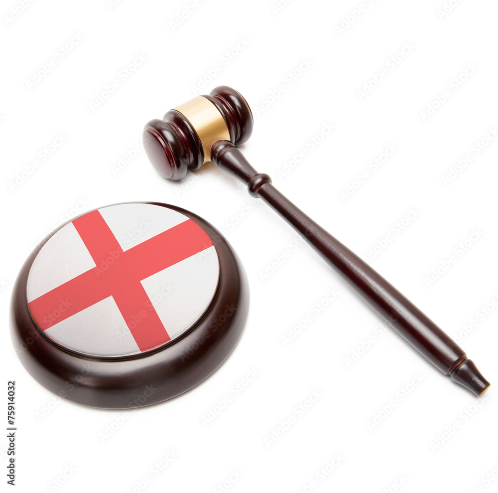 Judge gavel and soundboard with national flag on it - England