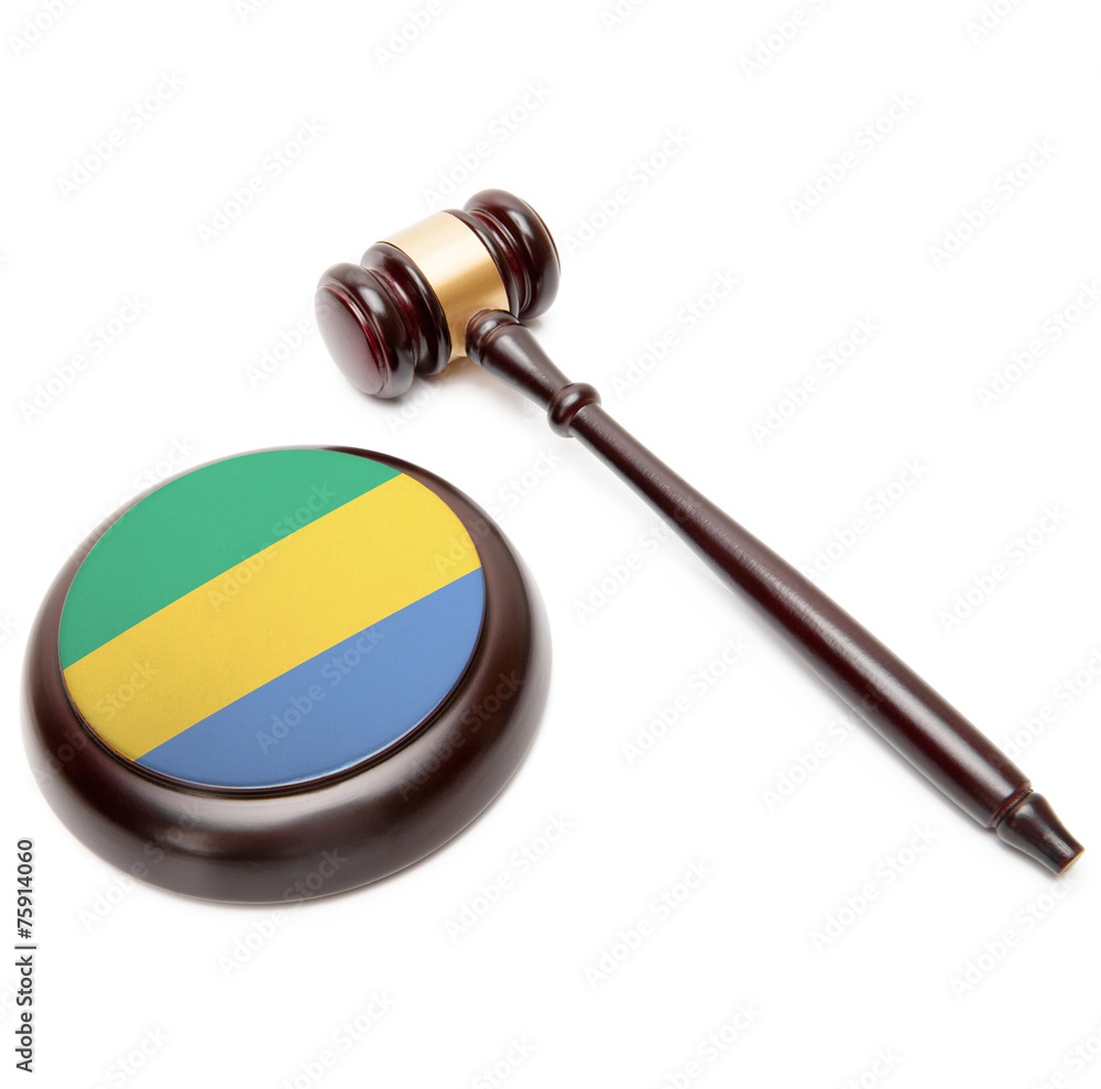 Judge gavel and soundboard with national flag on it - Gabon