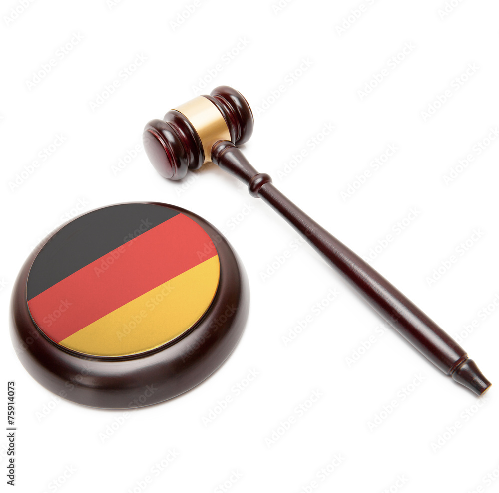 Judge gavel and soundboard with national flag on it - Germany